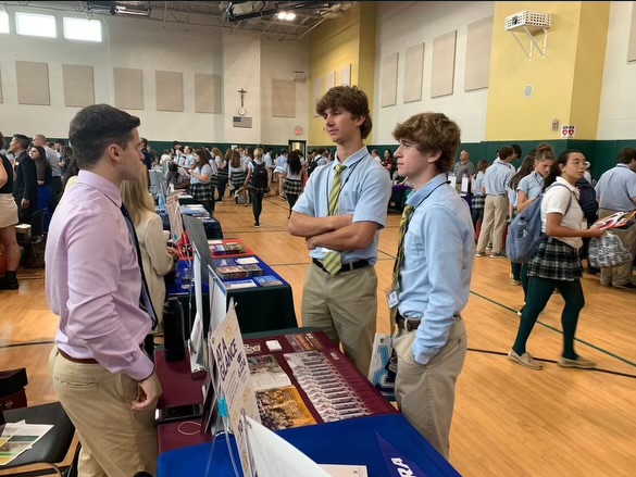 Students had the opportunity to ask college representatives questions at the College Fair.
 Picture Credits: Bishop Feehan High School